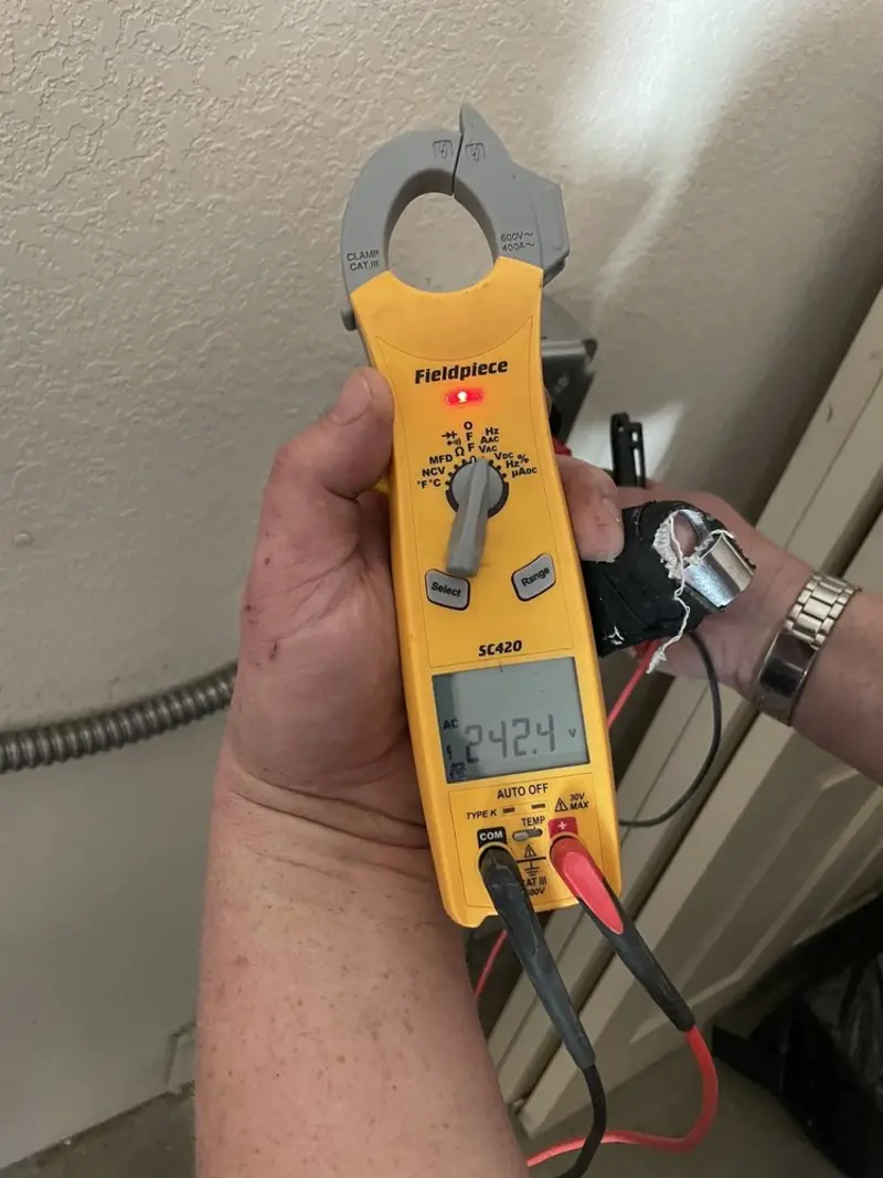 Voltage testing with clamp meter during Circuit Breaker Repair in Mountlake Terrace